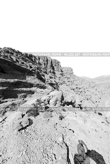  gorge and canyon the deep cloudy sky   in oman the old  mountain . Стоковое фото, агентство Ingram Publishing / Фотобанк Лори