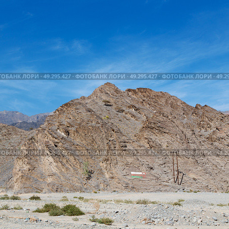  gorge and canyon the deep cloudy sky   in oman the old  mountain . Стоковое фото, агентство Ingram Publishing / Фотобанк Лори