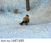 Зимний день. Женщина катится на санках с горки (2009 год). Редакционное фото, фотограф lana1501 / Фотобанк Лори
