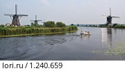 Ветряные мельницы. Киндердяйк. Нидерланды (2009 год). Стоковое фото, фотограф Петр Кириллов / Фотобанк Лори