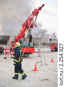 Подъем стрелы пожарного крана "Liebherr" (2010 год). Редакционное фото, фотограф Алёшина Оксана / Фотобанк Лори