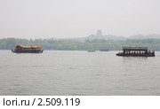Прогулки на лодках по озеру Сиху в Китае (2011 год). Стоковое фото, фотограф Владимир Чинин / Фотобанк Лори