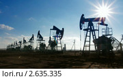 Ряд нефтяных насосов - таймлапс. Стоковое видео, видеограф Михаил Коханчиков / Фотобанк Лори