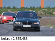 Спортивные автомобили, участвующие в гонке суперкаров (2011 год). Редакционное фото, фотограф Литвяк Игорь / Фотобанк Лори