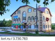 Торговый центр в городе Нытва. Пермский край. Россия (2012 год). Редакционное фото, фотограф Андрей Щекалев (AndreyPS) / Фотобанк Лори