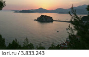 Закат солнца и островок Свети-Стефан (Sveti Stefan). Черногория. (2012 год). Стоковое видео, видеограф Юрий Брыкайло / Фотобанк Лори