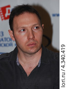 Кинорежиссёр, клипмейкер, писатель Михаил Сегал (2013 год). Редакционное фото, фотограф Александр Легкий / Фотобанк Лори