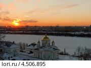 Храм Святителя Алексия Московского в Нижнем Новгороде, на фоне красочного зимнего заката (2013 год). Редакционное фото, фотограф Nikolay Pestov / Фотобанк Лори