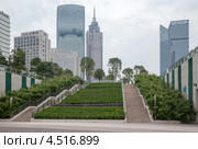 Башня Жемчужной реки и Гостиница Гранд Хаятт в деловом районе Zhujiang New Town, Гуанчжоу, провинция Гуандун, Китай (2011 год). Редакционное фото, фотограф Losevsky Pavel / Фотобанк Лори