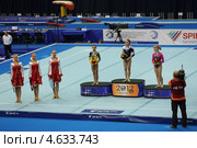 Чемпионат Европы по спортивной гимнастике 2013 года. Москва, СК "Олимпийский". Победители состязаний на бревне - Лариса Йордаке (Larisa Iordache), Диана Булимар (Diana Bulimar) и Анастасия Гришина (Anastasia Grishina) Редакционное фото, фотограф Игорь Долгов / Фотобанк Лори