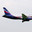Самолёт Superjet-100 (бортовой RA-89010) авиакомпании Аэрофлот в ливрее ЦСКА на посадке в Шереметьево (2013 год). Редакционное фото, фотограф Alexei Tavix / Фотобанк Лори