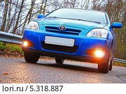 Автомобиль Toyota Corolla Hatch (Е121) (2013 год). Редакционное фото, фотограф Елена Кутепова / Фотобанк Лори