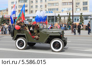 Советский военный автомобиль ГАЗ-67 на Первомайской улице Тюмени (2013 год). Редакционное фото, фотограф Анатолий Матвейчук / Фотобанк Лори