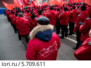 Активисты движения "Суть времени" участвуют в митинге "В поддержку Крыма и против фашизма" на площади Революции города Москвы 15 марта 2014. Редакционное фото, фотограф Николай Винокуров / Фотобанк Лори