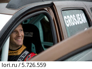 Портрет пилота Формулы 1 Ромена Грожана (команда Lotus F1 Team) в автомобиле Дастер на "Гонке звезд" за приз журнала "За рулем" 23 февраля 2014. Редакционное фото, фотограф Николай Винокуров / Фотобанк Лори