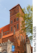 Колокольня церкви Святого Иакова (1350 г.), город Торунь, Польша. Объект ЮНЕСКО (2014 год). Стоковое фото, фотограф Иван Марчук / Фотобанк Лори
