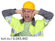 Workers covered their ears. Стоковое фото, фотограф Phovoir Images / Фотобанк Лори