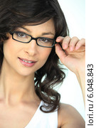 Attractive young woman wearing glasses. Стоковое фото, фотограф Phovoir Images / Фотобанк Лори
