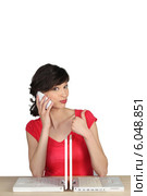 Brunette with two computers and mobile telephone. Стоковое фото, фотограф Phovoir Images / Фотобанк Лори