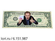 Businessman emerging from dollar bill. Стоковое фото, фотограф Phovoir Images / Фотобанк Лори
