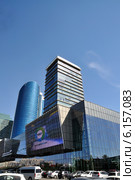 Город Астана. Реклама на небоскребе ЖК "Казахстан Темир Жолы (КТЖ)" (2014 год). Редакционное фото, фотограф Александр Тараканов / Фотобанк Лори