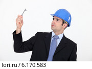 Man wearing hard hat. Стоковое фото, фотограф Phovoir Images / Фотобанк Лори