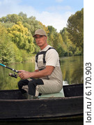 Man fishing. Стоковое фото, фотограф Phovoir Images / Фотобанк Лори