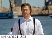 Чернышев Илья Игоревич – Директор Государственного автономного учреждения культуры Парка культуры и отдыха "Северное Тушино" выступает перед зрителями на празднике День ВМФ в парке, Москва (2014 год). Редакционное фото, фотограф Николай Винокуров / Фотобанк Лори