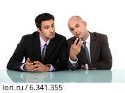 Man looking at his colleague. Стоковое фото, фотограф Phovoir Images / Фотобанк Лори
