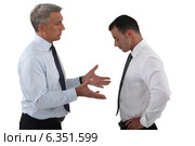 Businessmen having a serious discussion. Стоковое фото, фотограф Phovoir Images / Фотобанк Лори