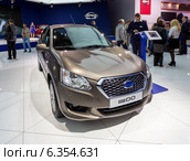 Datsun on-DO. Московский международный автомобильный салон 2014. Редакционное фото, фотограф Сергей Лаврентьев / Фотобанк Лори