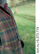 A close-up of a hunters jacket. Стоковое фото, агентство Ingram Publishing / Фотобанк Лори