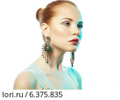 Portrait of beautiful young woman with earring. Fashion photo. Стоковое фото, агентство Ingram Publishing / Фотобанк Лори