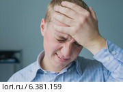 Males sore headache. Стоковое фото, агентство Ingram Publishing / Фотобанк Лори