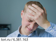 Males sore headache. Стоковое фото, агентство Ingram Publishing / Фотобанк Лори
