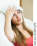 problems girl with intense headache. Стоковое фото, фотограф Яков Филимонов / Фотобанк Лори