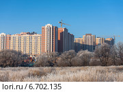 ТиНАО, Коммунарка. Вид на дома-новострйки и поле осенью в Новой Москве (2014 год). Стоковое фото, фотограф Алексей Голубович / Фотобанк Лори