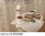 Кофе, немецкий маковый пирог, белая свеча и шоколад. Стоковое фото, фотограф Зинаида Зайко / Фотобанк Лори