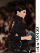 NEW YORK, NY - SEPTEMBER 11: A model walks the runway at Ralph Lauren fashion show during Mercedes-Benz Fashion Week Spring 2015 on September 11, 2014 in New York City. Редакционное фото, фотограф Anton Oparin / Фотобанк Лори