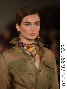 NEW YORK, NY - SEPTEMBER 11: A model walks the runway at Ralph Lauren fashion show during Mercedes-Benz Fashion Week Spring 2015 on September 11, 2014 in New York City. Редакционное фото, фотограф Anton Oparin / Фотобанк Лори