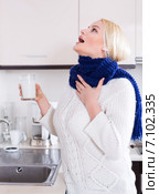 Woman standing with gargle solution. Стоковое фото, фотограф Яков Филимонов / Фотобанк Лори