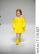 NEW YORK, NY - OCTOBER 18: A model walks the runway during the Oil & Water preview at petitePARADE / Kids Fashion Week at Bathhouse Studios on October 18, 2014 in New York City. Редакционное фото, фотограф Anton Oparin / Фотобанк Лори