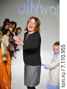 NEW YORK, NY - OCTOBER 18: Designer Amy Wismar walks the runway with models during the Oil & Water preview at petitePARADE / Kids Fashion Week at Bathhouse Studios on October 18, 2014 in New York City. Редакционное фото, фотограф Anton Oparin / Фотобанк Лори