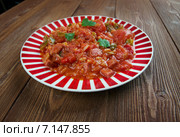 Weeknight Jambalaya - креольское блюдо с рисом, овощами и колбасой. Стоковое фото, фотограф Александр Fanfo / Фотобанк Лори