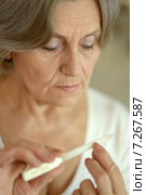 Woman with nail file. Стоковое фото, фотограф Ruslan Huzau / Фотобанк Лори