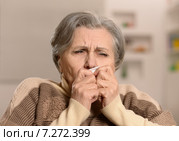 Mature woman fells ill a cold. Стоковое фото, фотограф Ruslan Huzau / Фотобанк Лори