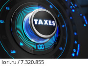 Круглая ручка управления с надписью Taxes. Стоковая иллюстрация, иллюстратор Илья Урядников / Фотобанк Лори