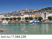 Deauville is on the Normandy coast of France in the Calvados region. Famous for its racecourse harbor marinas casino and hotels Deauville is a popular destination for Parisians. Стоковое фото, агентство BE&W Photo / Фотобанк Лори
