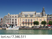Deauville is on the Normandy coast of France in the Calvados region. Famous for its racecourse harbor marinas casino and hotels Deauville is a popular destination for Parisians. Стоковое фото, агентство BE&W Photo / Фотобанк Лори