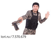 Surrendering man in military uniform holding gun isolated on white. Стоковое фото, фотограф Elnur / Фотобанк Лори